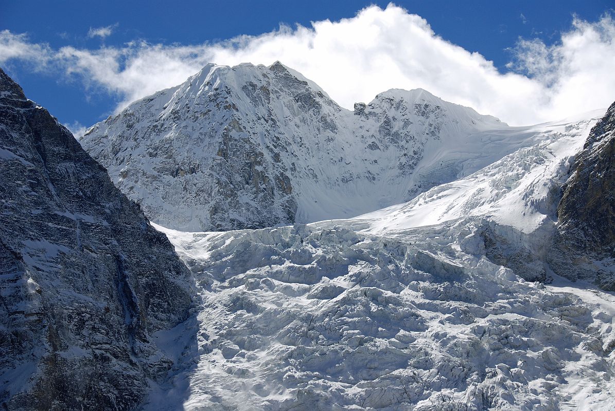 05 Gyalzen Peak Close Up From Just After Shingdip On Trek To Shishapangma Southwest Advanced Base Camp Gyalzen Peak (6151m) from just past Shingdip. The British all-womens Himalayan Expedition was the first expedition to the Jugal Himal and the first to climb a peak in either Langtang or the Jugal. Monica Jackson and Elizabeth Stark reached the summit on May 11, 1955 via the south side from Phurbi Chyachu Glacier. Ang Temba and Mingma Gyalzen, after whom the mountain was named, also made it to the summit.